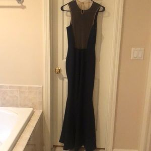 Evening  gowned. Transparent back. Never worn.